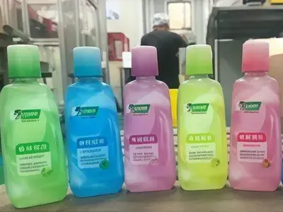 تركيب شريط شرنك أمان على عنق عبوات غسول الفم