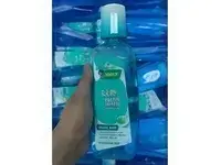 تركيب شريط شرنك أمان على عنق عبوات غسول الفم