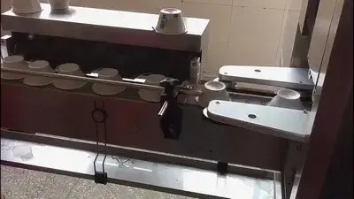 ماكينة تركيب شرنك سليف على الأكواب والأوعية